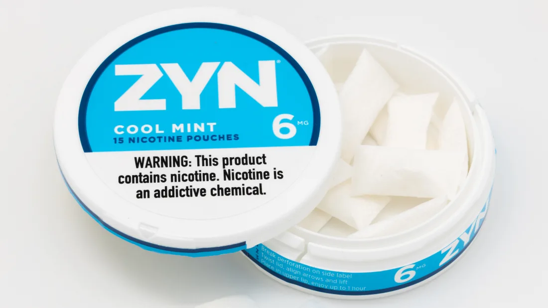 Cans of ZYN tobacco-free nicotine pouches, the legal UK alternative to banned tobacco snus