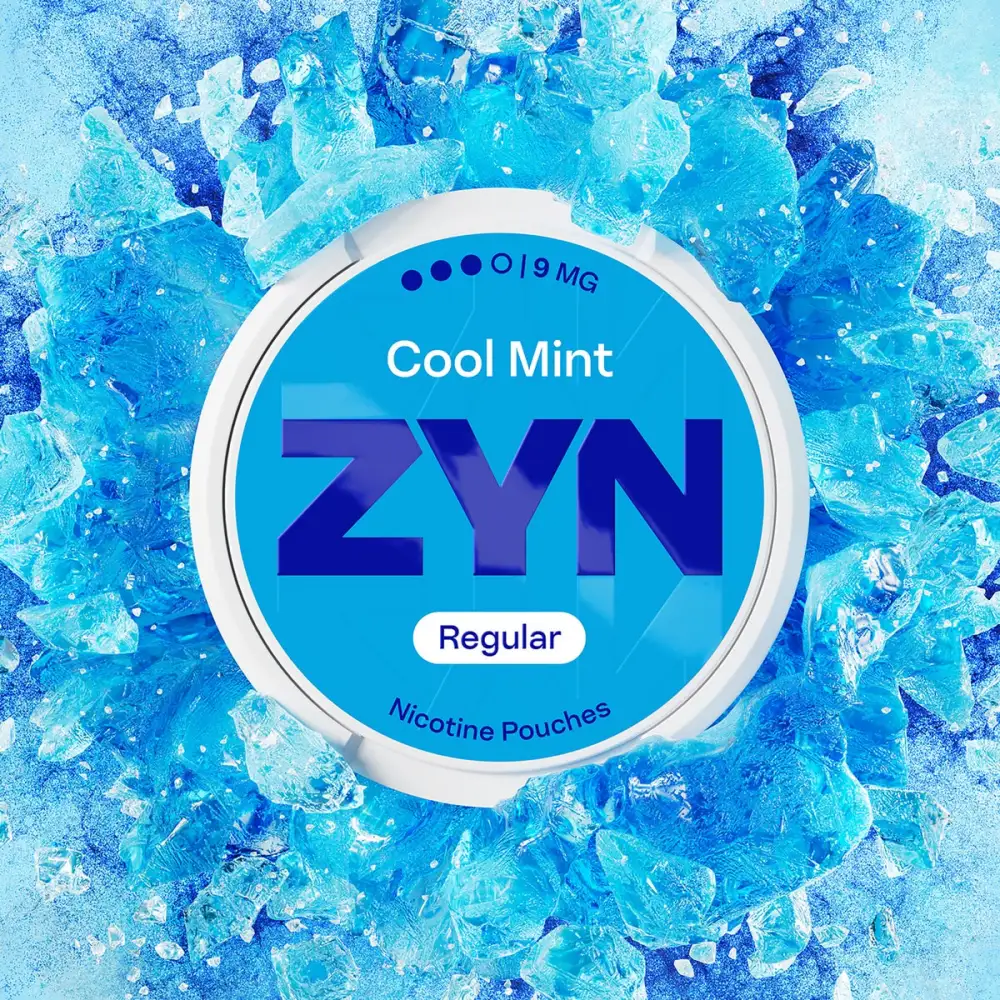 ZYN Cool Mint nicotine pouches can surrounded by ice, official ZYN UK banner imagery