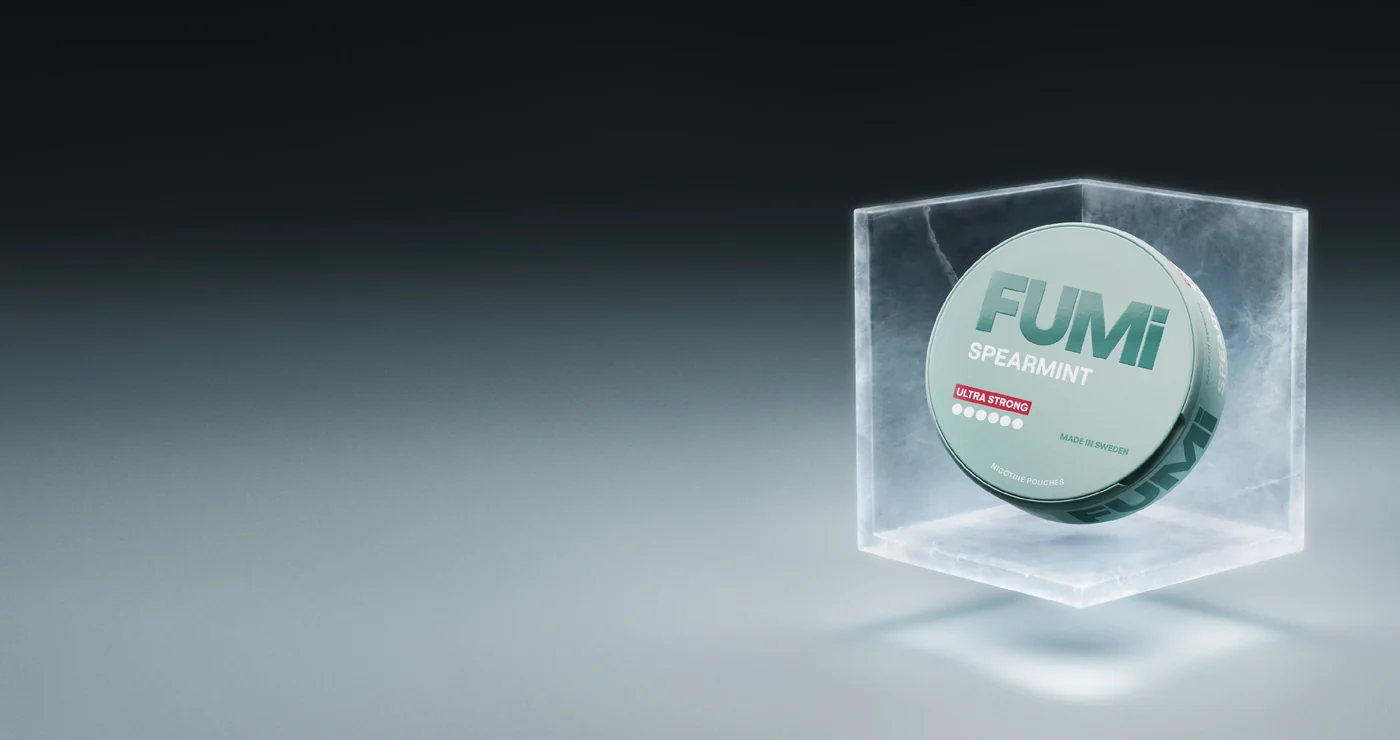 Fumi Spearmint Ultra Strong 15mg nicotine pouches can in an ice cube, official Fumi brand banner