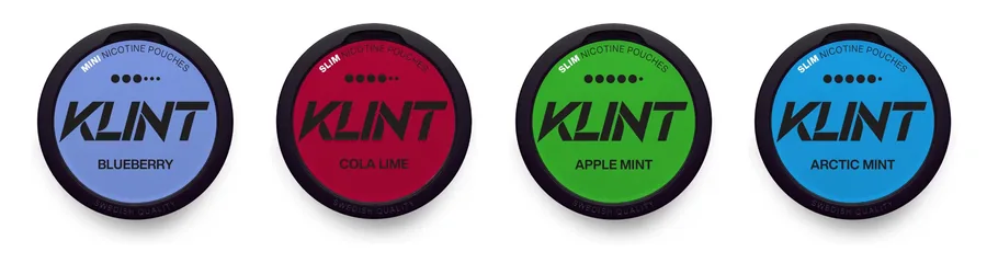 Official Klint nicotine pouch cans: Blueberry mini, Cola Lime and Apple Mint above Arctic Mint and Avalanche Mint, each lid showing its six-dot strength rating