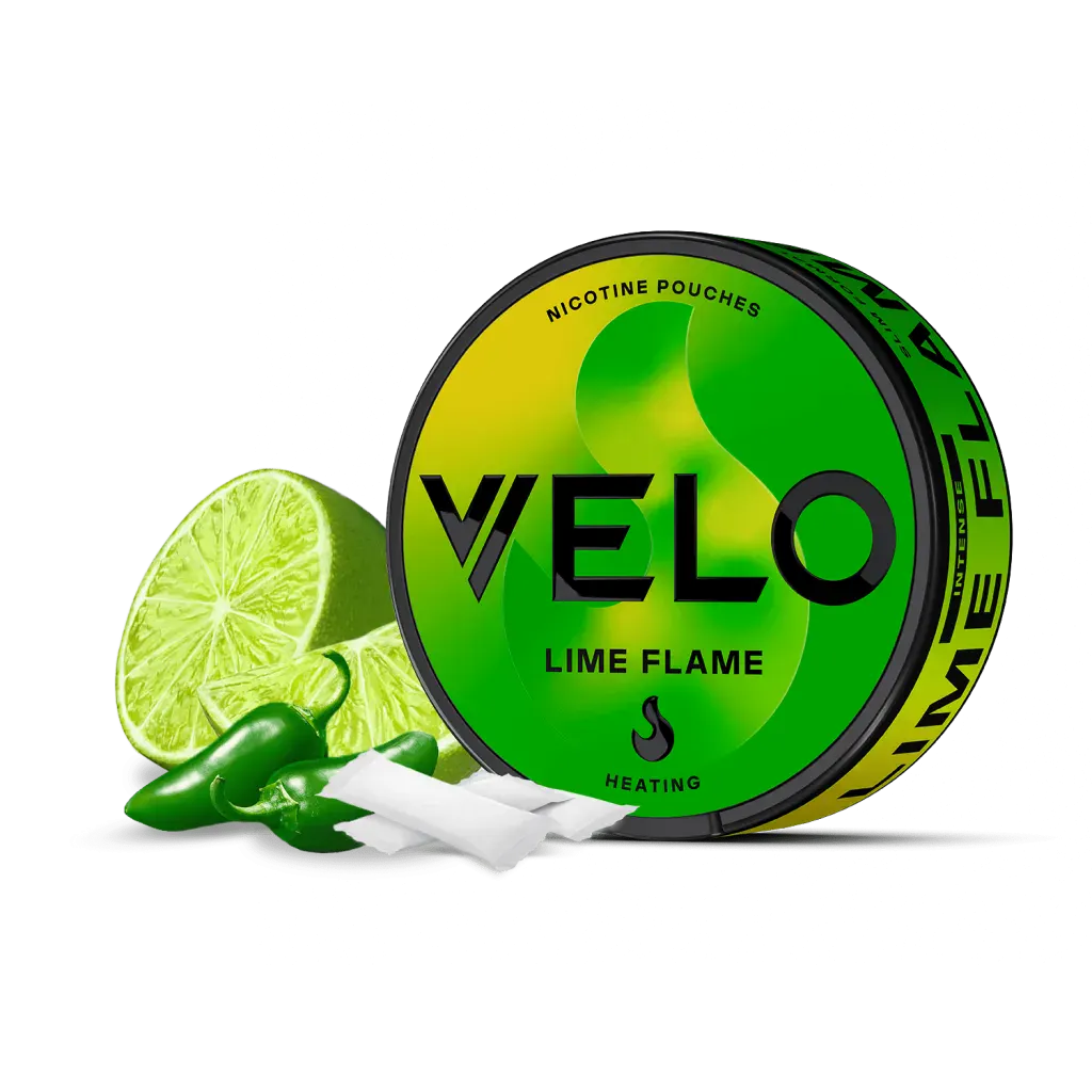 Official VELO Lime Flame nicotine pouches slim can with lime and jalapeno chilli beside white slim pouches