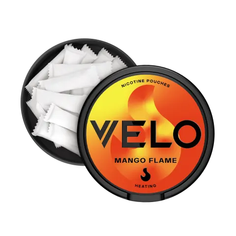 Open VELO Mango Flame can showing the slim white tobacco-free nicotine pouches inside and the catch lid compartment