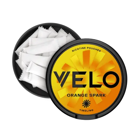Open VELO Orange Spark can showing the slim white tobacco-free nicotine pouches and the catch lid compartment