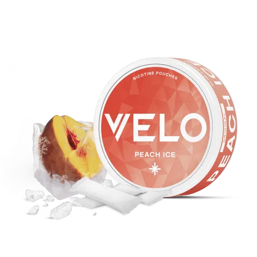 VELO Peach Ice nicotine pouches can in coral and white, shown with a fresh peach set in ice and slim white tobacco-free pouches