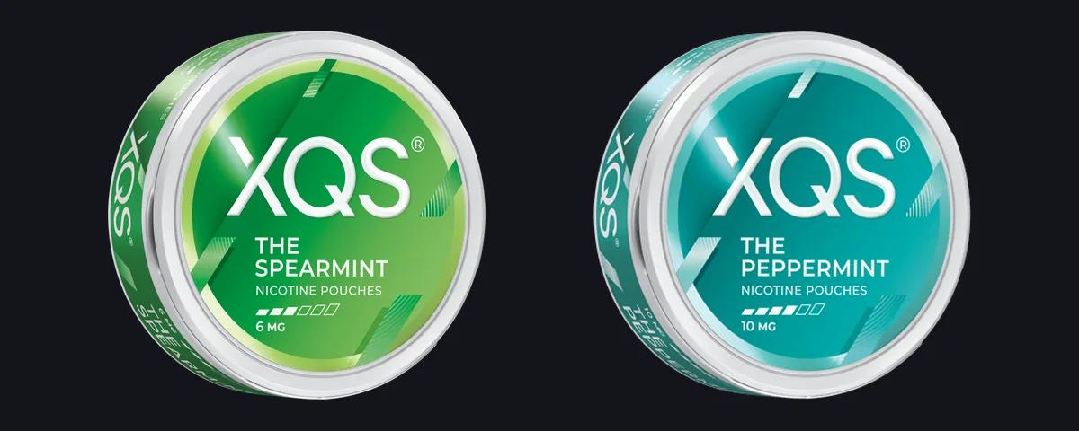 XQS The Spearmint 6mg can with three of six bars beside XQS The Peppermint 10mg can with four bars