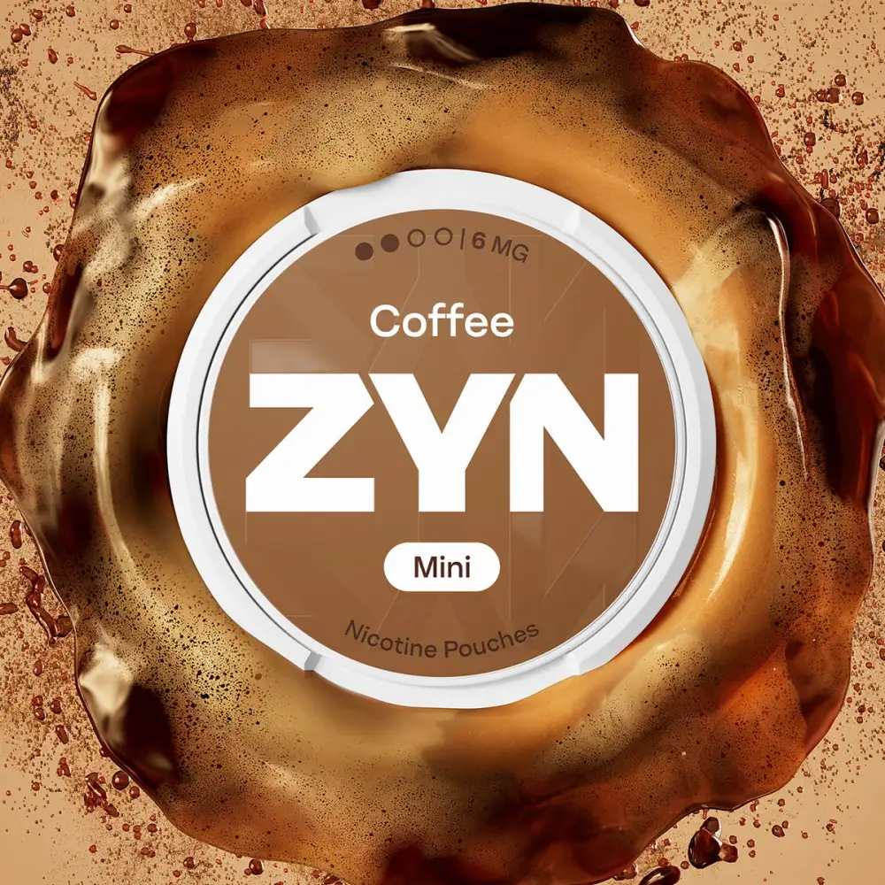 Official ZYN Coffee nicotine pouches Mini 6mg can at the centre of a swirl of coffee and crema